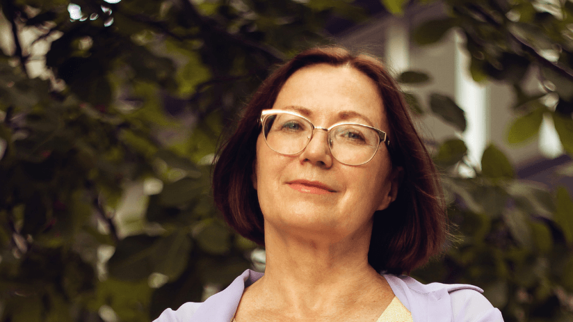 Brunette mature woman wearing glasses with anti wrinkle injections in Midhurst