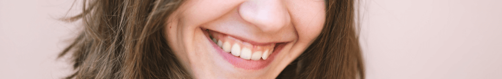 Woman with Invisalign braces in Midhurst, West Sussex smiling